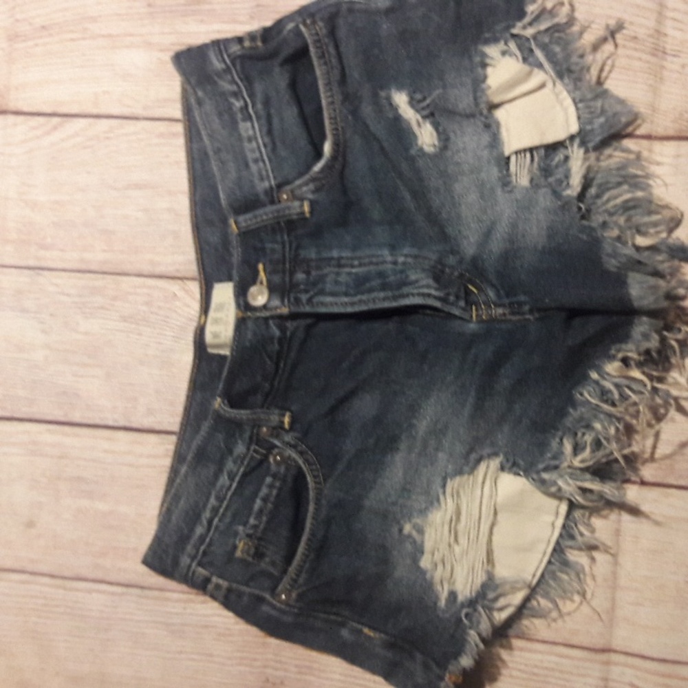 We The Free distressed button front denim shorts